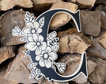 Wooden letter with flowers