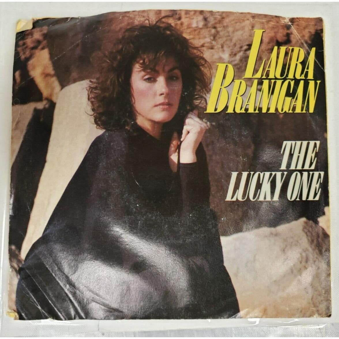 Record 45 RPM Laura Branigan - the Lucky One / Breaking Out
