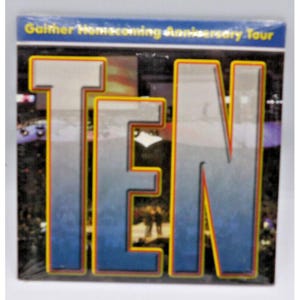 May include: A blue and yellow poster with the word "TEN" in large, bold letters. The background is a blurry image of a crowd of people. The text "Gaither Homecoming Anniversary Tour" is at the top of the poster.