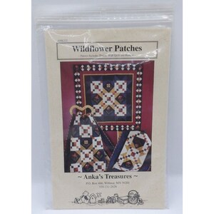 Op de afbeelding: Een quiltpatroon voor een Wildflower Patches-deken. Het patroon bevat instructies voor een deken, een wanddeken en een loper. Het patroon is van Anka's Treasures, P.O. Box 466, Willmar, MN 56201, 320-231-2626.