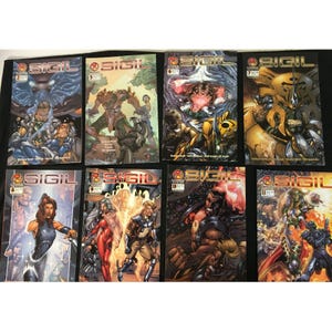 May include: A set of eight comic books featuring a gold and black cover with the title "Sigil" and various illustrations. The comic books are numbered 1-8.