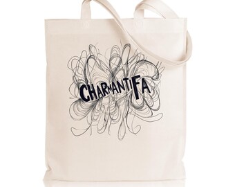 May include: A white canvas tote bag with black straps and a black graphic design of the word "CHARMANTIFA" in a swirling, abstract pattern.