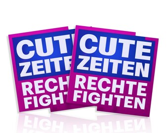 May include: Two rectangular signs with the text "CUT ZEITE RECHTE FIGHTEN" in white letters on a blue background, framed by a magenta border. The signs are slightly overlapping, with a white background.