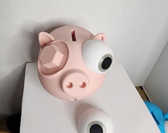 Googly eyed piggy bank