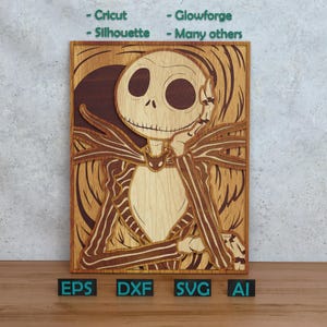 May include: Wooden layered art piece featuring Jack Skellington from The Nightmare Before Christmas. The artwork is made of various shades of wood, with the character's face and body in light wood and his suit in darker wood. The piece includes the text "- Cricut - Silhouette - Glowforge - Many others".