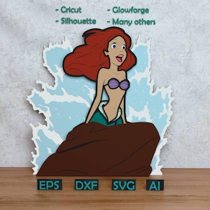 Könnte beinhalten: Ariel-Themen-Ausschnitt mit der Figur mit roten Haaren, einem lila Muschel-BH und einem grünen Schwanz. Das Design umfasst Meereswellen und den Text "EPS, DXF, SVG, AI". Geeignet für Cricut, Glowforge und Silhouette Maschinen.