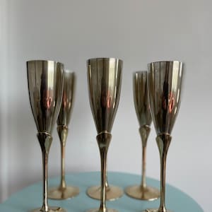 Brass champagne glasses
