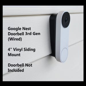 May include: A white and black Google Nest Doorbell 3rd Gen (Wired) mounted on a 4" vinyl siding mount. The doorbell is not included. The mount is attached to white siding.