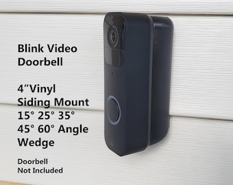 May include: A black 4-inch vinyl siding mount for a Blink video doorbell. The mount has adjustable angles of 15, 25, 35, 45, and 60 degrees. The doorbell is not included.