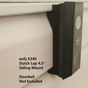 May include: Black eufy E340 Dutch Lap 4.5" Siding Mount for a doorbell. The doorbell is not included.