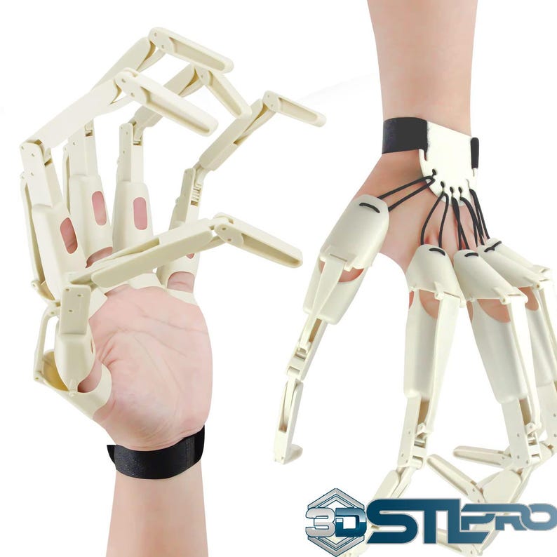May include: Two articulated, off-white prosthetic hands are shown. One is worn on a wrist with a black band, and the other is held in a hand with a black wristband. The fingers are connected by small black cords. The logo "3DSTEREO" is in the bottom right corner.