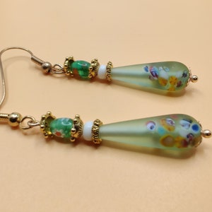 Peridot green Murano glass and gold  earrings. Dangle earrings