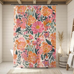 May include: A shower curtain featuring a repeating pattern of hand-painted style flowers in shades of bright orange, soft pink, and deep forest green on a cream background. The floral design includes various petal shapes and leafy stems.