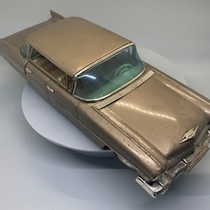 1963 Bandia Gold Cadillac Japanese Tin Friction Toy