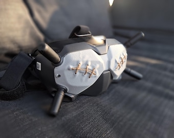 Abdeckung/ faceshield für DJI Goggles V1 / V2 im „Zugenähte Augen“- Design – FPV Zubehör – 3D gedruckt als Ersatz für die Originalabdeckung