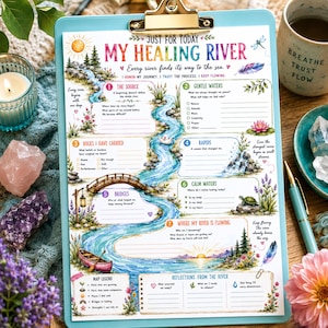 May include: A printed worksheet titled My Healing River on a light blue clipboard. The document features a central river illustration with seven numbered sections for journaling, including prompts like The Source, Rocks I Have Carried, and Bridges.