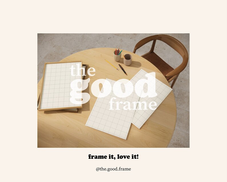 May include: A wooden table with two white gridded papers and a wooden frame with a white gridded paper inside. The text "the good frame" is in white letters on the table.
