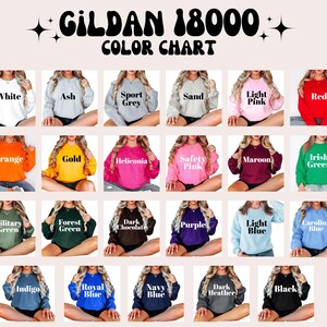 May include: A color chart for Gildan 18000 sweatshirts, showcasing a variety of colors including white, ash, sport grey, sand, light pink, red, orange, gold, and more. Each color is displayed on a sweatshirt.
