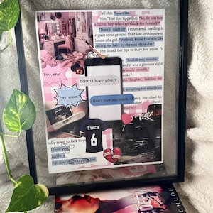 May include: A framed collage with a black frame, featuring a book titled "Redeeming 6" by Chloe Walsh, and a collection of images and text snippets. The collage includes a jersey with "LYNCH 6", hearts, and text bubbles with phrases like "I don't love you. x".