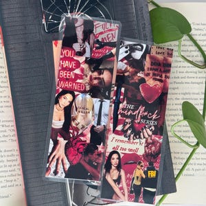May include: Three aesthetic bookmarks with collage designs. One bookmark reads "You Have Been Warned" in red text. Another says "The Mindf*ck Series" and "I remember it all too well". The third bookmark has the text "FUL MEN".