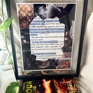 May include: A framed collage featuring book pages, dragon scales, and a stormy sky. The text includes phrases like "I would rather lose this entire" and "She'll fight this war at my side." A book with a dragon illustration is at the bottom.