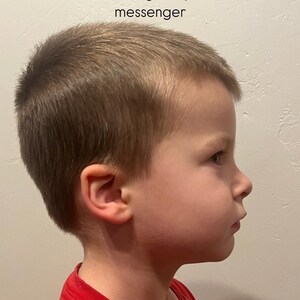 May include: A profile view of a young child with short brown hair, wearing a red shirt. The image includes text at the top that reads, "Example of profile picture to send through Etsy messenger."