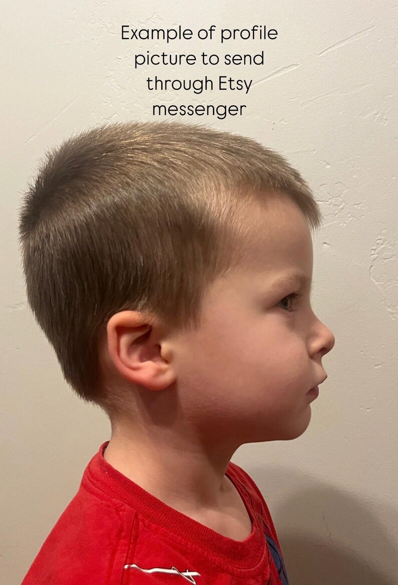 May include: A profile view of a young child with short brown hair, wearing a red shirt. The image includes text at the top that reads, "Example of profile picture to send through Etsy messenger."
