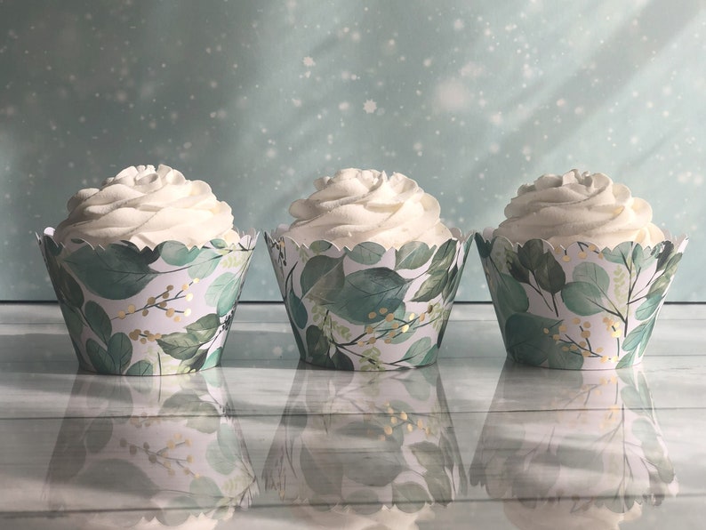 Fancy scalloped cupcake wrapper. Green sage eucalyptus leaves accented with gold foil berries. Dress up your cupcakes. Perfect for wedding or bridal showers, a tea party or just to dress up your event.