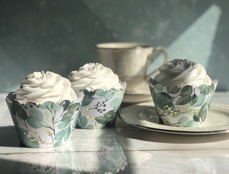 Fancy scalloped cupcake wrapper. Green sage eucalyptus leaves accented with gold foil berries. Dress up your cupcakes. Perfect for wedding or bridal showers, a tea party or just to dress up your event.