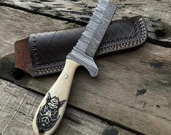 Handgjord Damaskus-tjurkniv, svinhuvudhandtag, läderslida