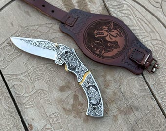 Handmade Wolf Engraved Folding Knife: D2 Steel Blade, Leather Wristband