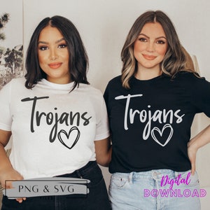 May include: Two people wearing black and white t-shirts with the text "Trojans" and a heart design. The shirts are available as digital downloads in PNG and SVG formats.
