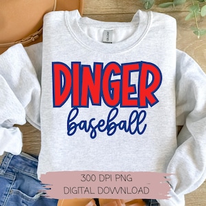 May include: A gray sweatshirt with the text "DINGER baseball" in red and blue lettering. The text is in a bold, cartoon-like font.