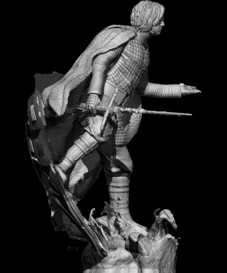 May include: A gray, detailed figurine of a character from a fantasy movie. The character is wearing a long cloak and holding a sword. The figurine is standing on a rocky base.