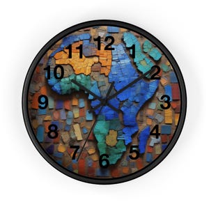 May include: Round wall clock with a black frame. The clock face features a colorful mosaic of the African continent. The numbers are black and the hands are black. The mosaic is made of various shades of blue, green, orange, and brown.
