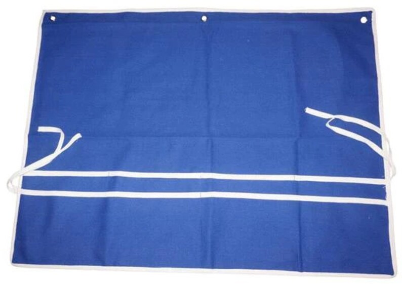 May include: A blue canvas tool roll with white trim and two white straps. The roll has three pockets.