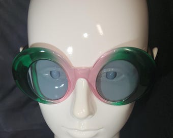 Pink and green round sunglasses