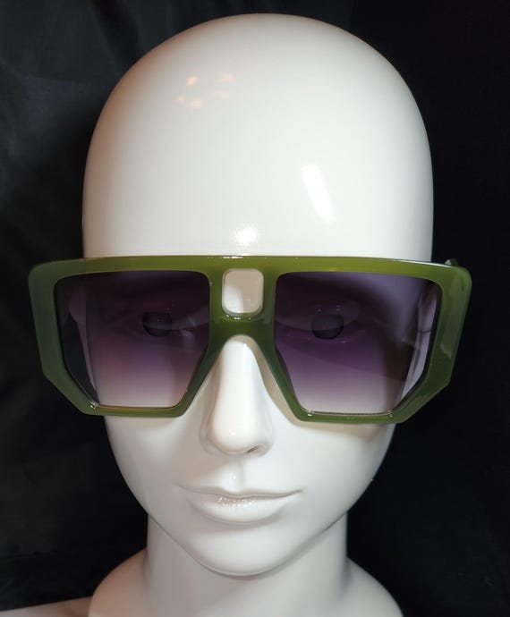 Gafas de sol color verde cazador España