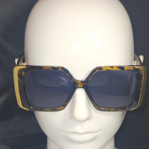 Gold square sunglasses