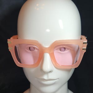 Pink square sunglasses