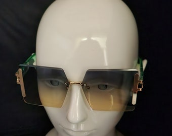 Gröna överdimensionerade fyrkantiga solglasögon