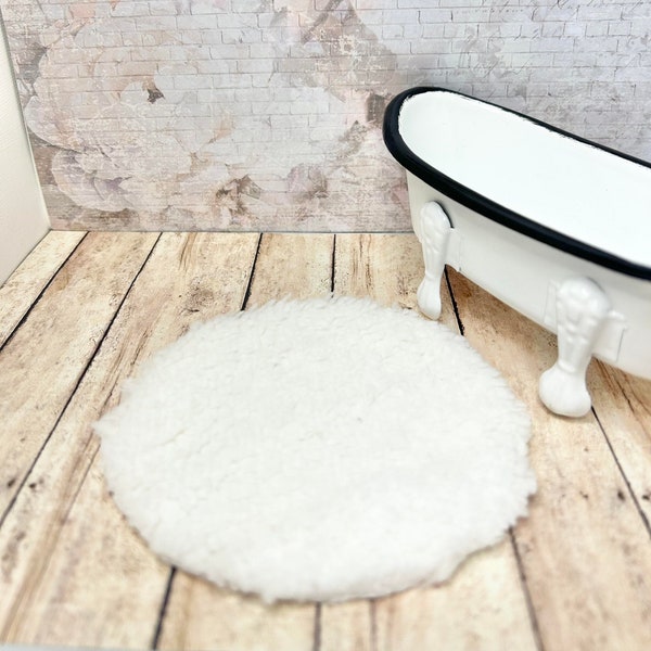 Fluffy white round dollhouse rug