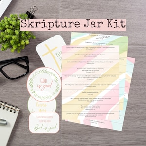 May include: A printable kit for a scripture jar with colourful stripes and a cross. The kit includes several cards with inspirational quotes and bible verses. The text on the cards includes phrases like "God is good", "God loves you", and "Keep the faith".