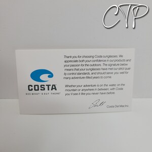 May include: A white card with the Costa Sunglasses logo, featuring a blue wave design and the text "COSTA SEE WHAT'S OUT THERE." The card includes text thanking customers and a signature.