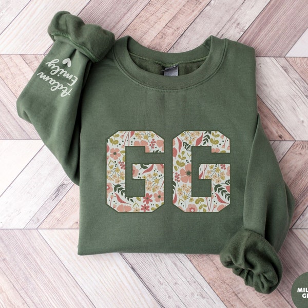 Custom GG Sweatshirt with Kids Name on Sleeve, Christmas Floral GG SweatShirt, Personalized Grandma Sweatshirt Mawmaw Gift For Nana Gigi Mug