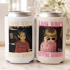 May include: Two cylindrical foam can coolers featuring custom photo prints of children. The left cooler has gold text reading LOOK WHO'S GETTING MARRIED above and below a photo of a child in a striped shirt. The right cooler has pink text with a photo of a child wearing sunglasses.