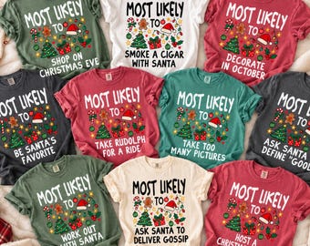 May include: A collection of nine short-sleeve crew neck t-shirts in green, white, red, and dark gray. Each shirt features the text "Most Likely To" followed by unique Christmas-themed phrases and colorful holiday graphics like trees and gifts.
