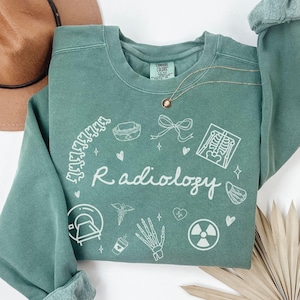 A thoughtful gift for graduation or first day on the job, this shirt celebrates your journey into the world of diagnostic imaging.