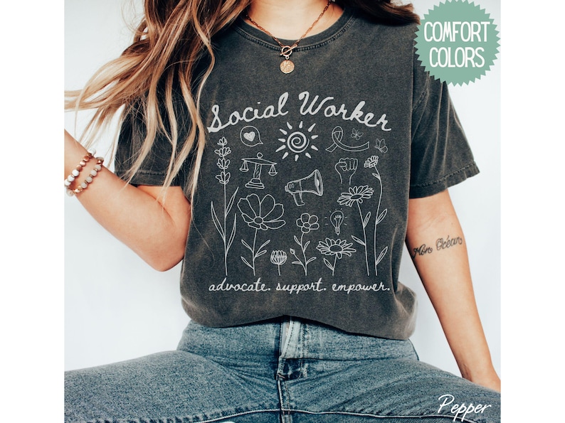 Floral social worker shirt featuring inspiring text, crafted for social work students, recent graduates, and experienced case managers making a difference.