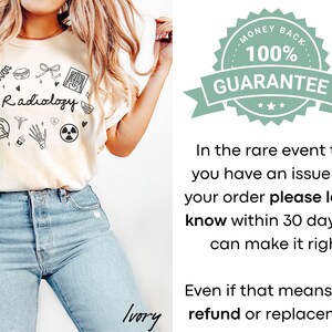 May include: A white t-shirt with a black graphic design of medical symbols and the word "Radiology". The shirt is being worn by a person with light brown hair and blue jeans. The text "Ivory" is written in the bottom right corner of the image.